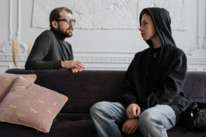 teenager talking to a psychiatrist