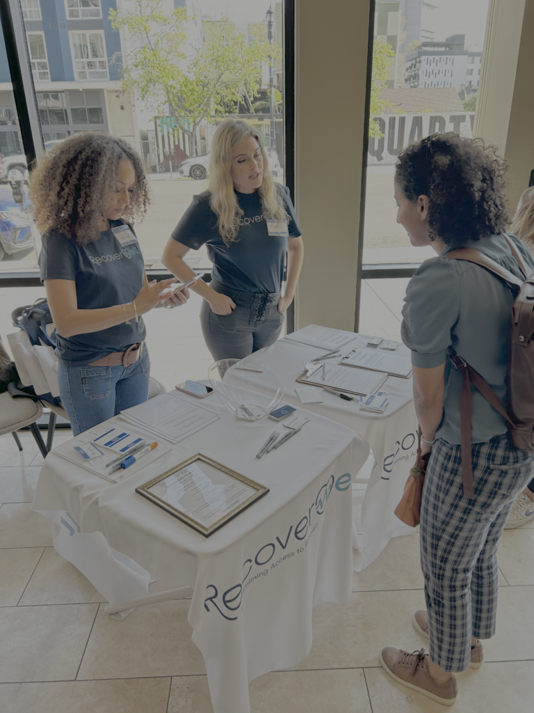 RecoverWell team working with community partners